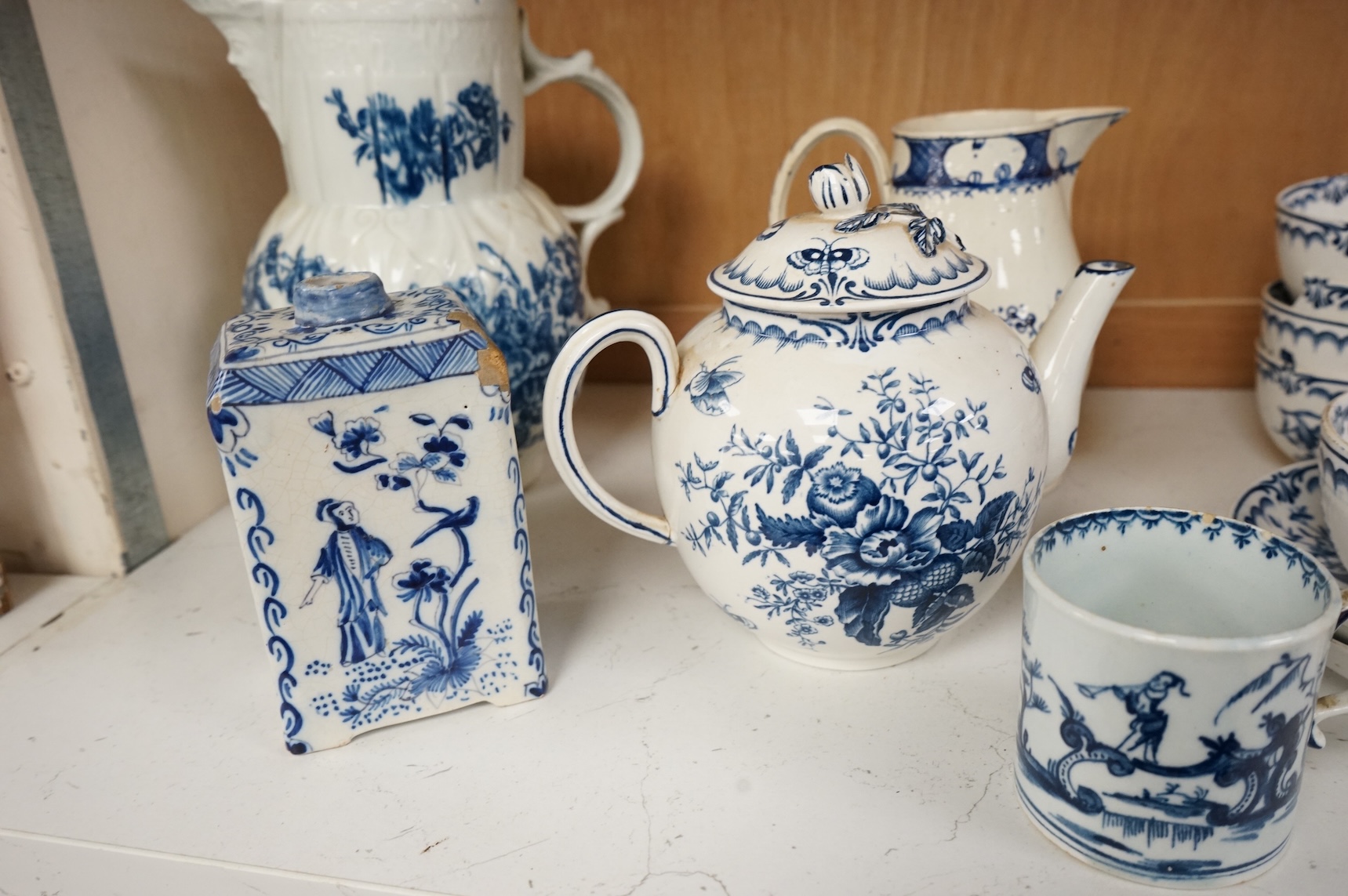 An 18th century blue and white Worcester jug and assorted Booths Worcester style tea wares, largest 24cm high